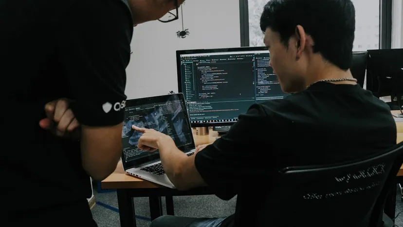 Engineers testing the system at a workstation